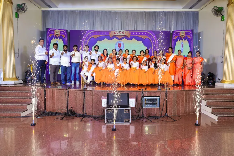 The whole cast on stage for the finale, with sparklers