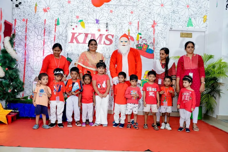 Teachers and Santa with a class