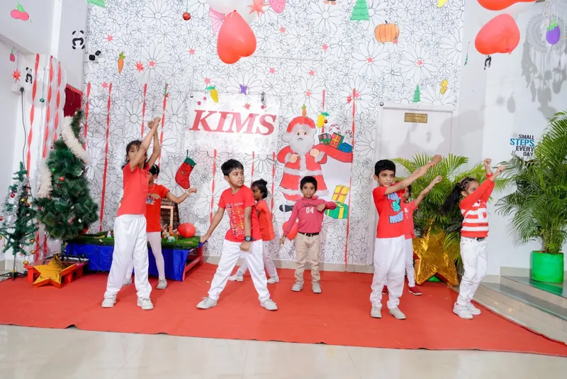 Children dance in red and white