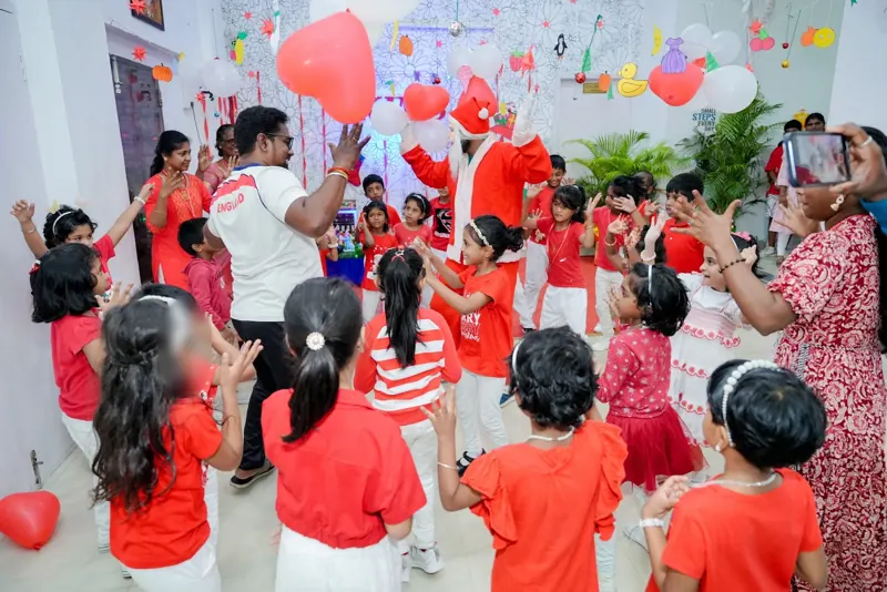 Children dance with Santa