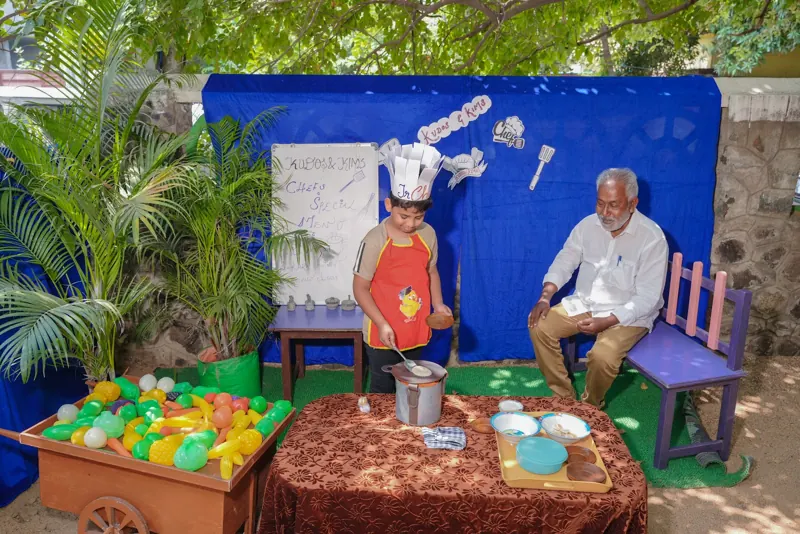 A grandparent visits the young chef