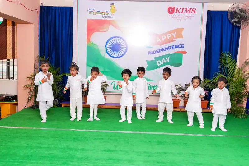 Children in white sing together