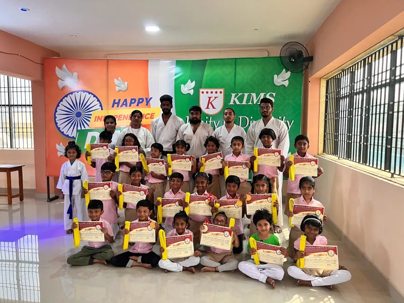 The karate class with their certificates and instructors