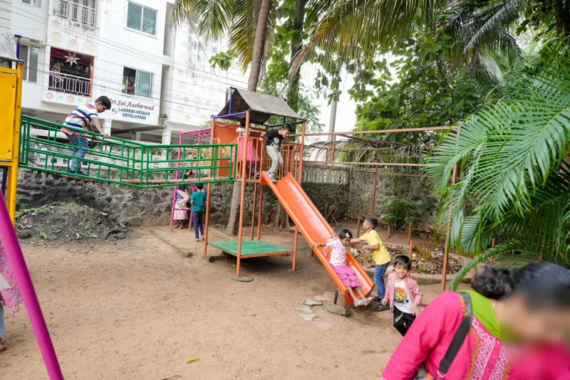 Children on the play structure and slide