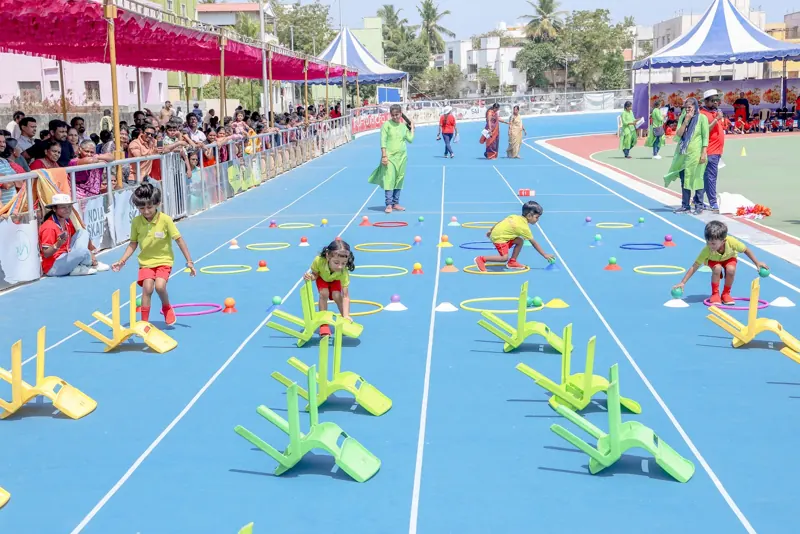 An obstacle race down the blue track