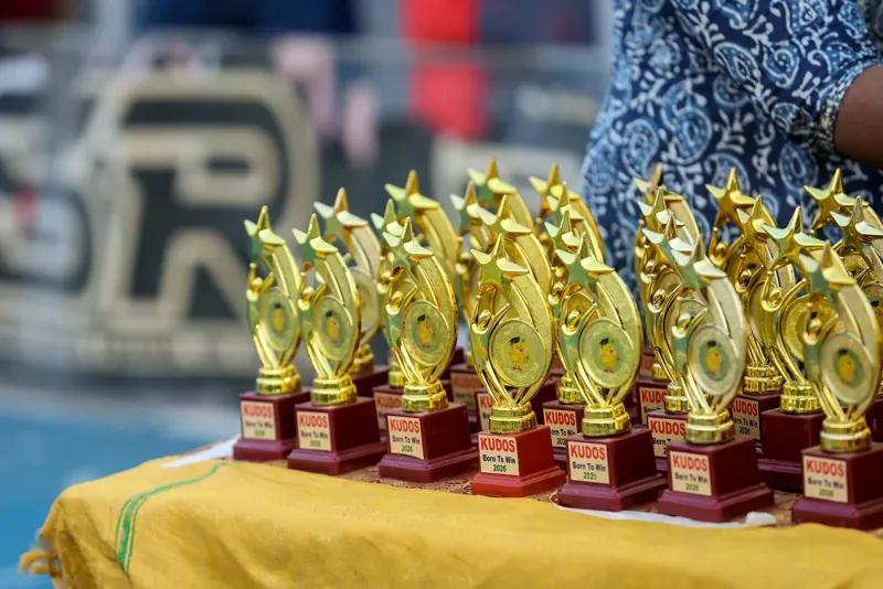 Gold trophies lined up for the prize-giving