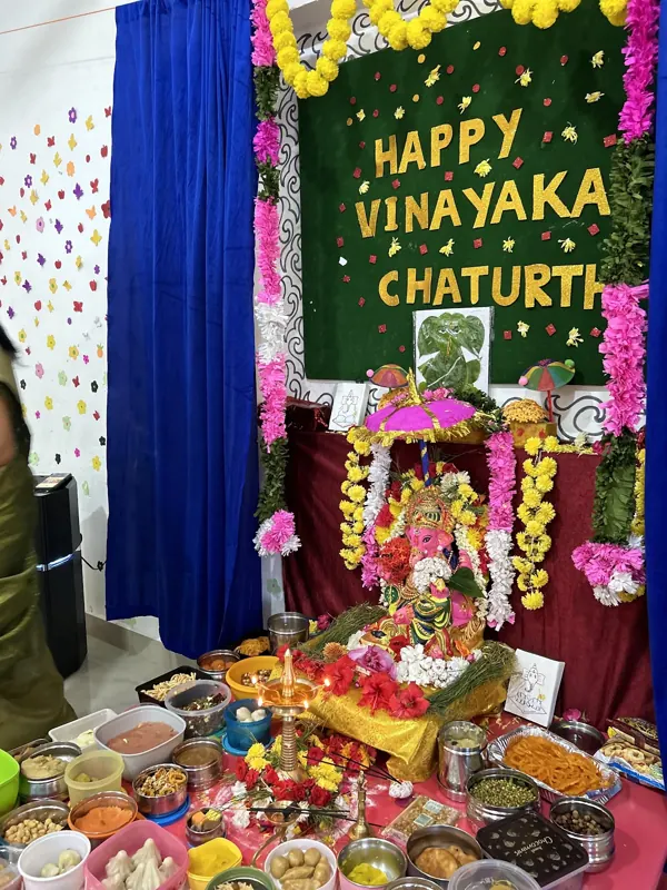 The Vinayaka Chaturthi altar with flowers, sweets and offerings